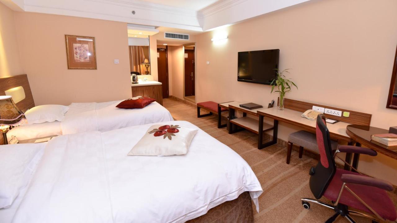 Bremen Holiday Hotel Harbin Exterior foto